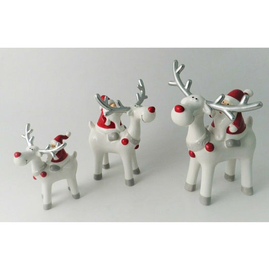 Ceramic Santa Riding Reindeer with Red Nose and Silver Antlers